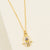 delicate dainty hamsa with cubic zirconia crystal and enamel evil eye gold pendant necklace