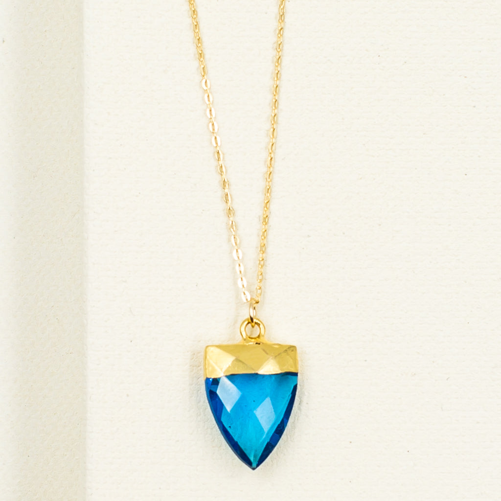 bright blue quartz crystal spear point pendant on gold filled chain necklace